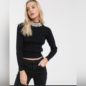 Elegant Black Long Sleeve Top with Pearl Detail